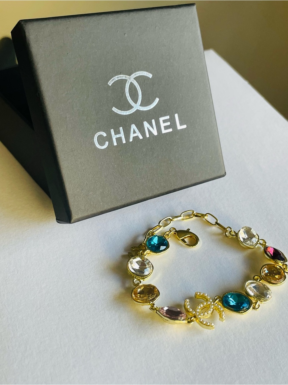 Gold interlocking CC faux pearl & multicolored crystal Bracelet